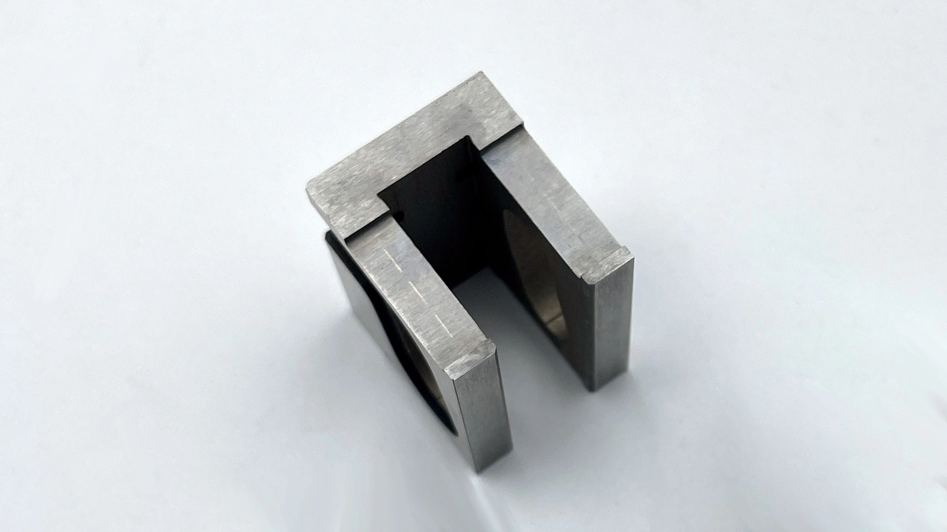 Close-up-of-a-precision-cut-metal-part-with-tight-tolerances Close-up-of-a-precision-cut-metal-part-with-tight-tolerances