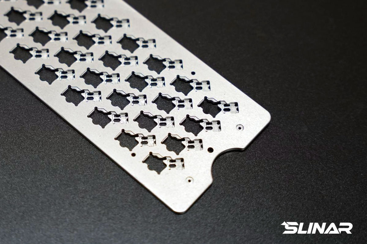 D2 tool steel fixture component with 32 WEDM-cut slots for 3C assembly